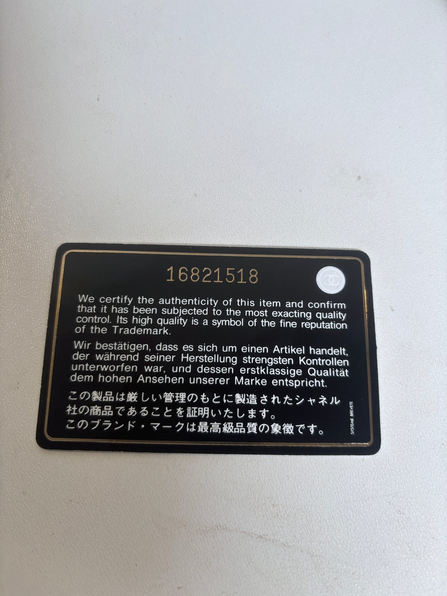 Chanel black leather "Camilia" wallet