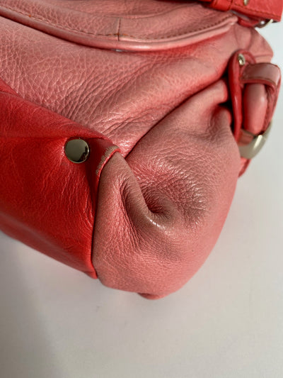 Wear on the Pink bag before restoration