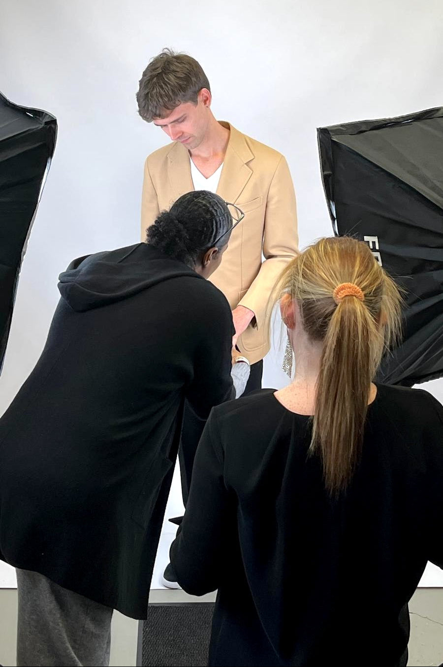 Dulce working with a fashion team